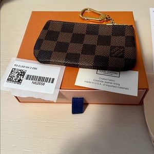 Louis Vuitton key chain and card holder